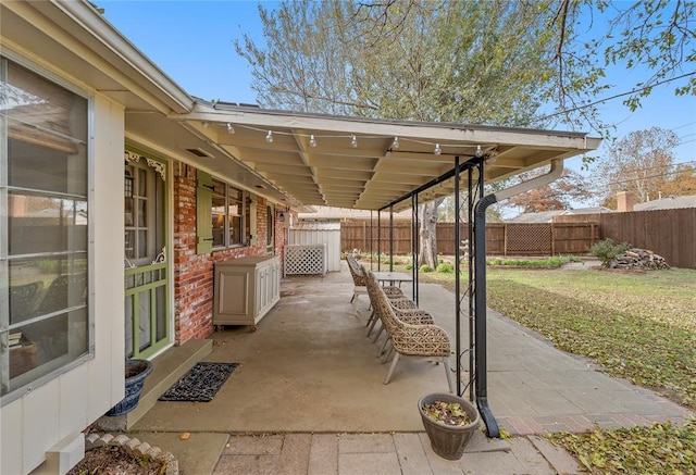 view of patio featuring a fenced backyard