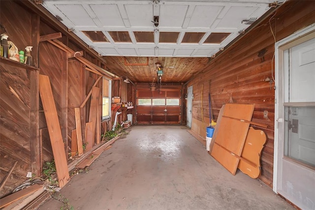 garage with wood walls