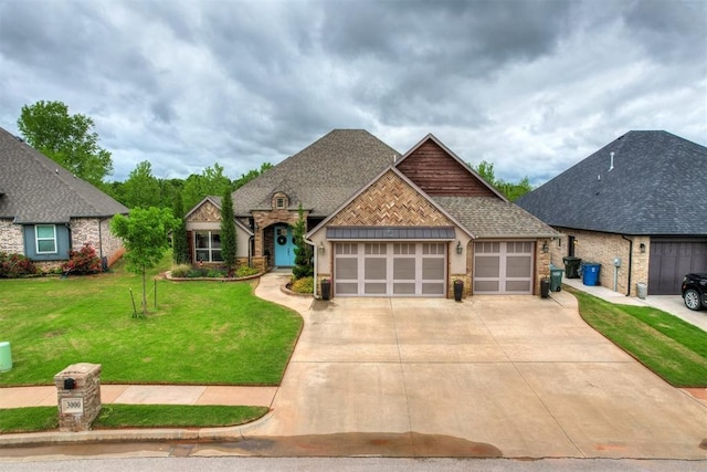 view of front of home featuring a shingled roof, a front lawn, brick siding, a garage, and concrete driveway