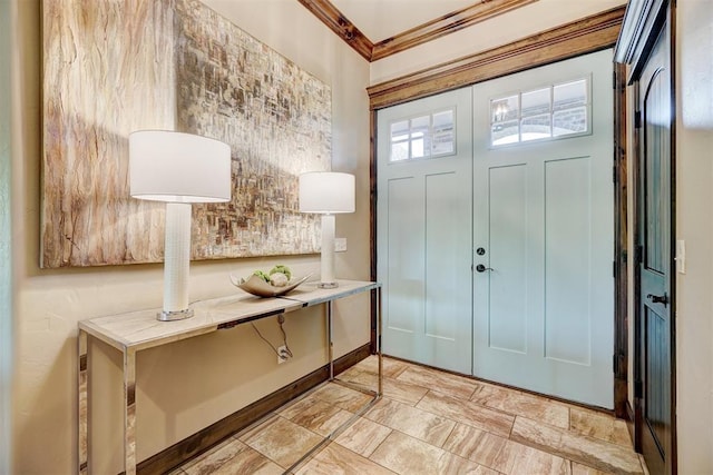 entrance foyer featuring crown molding