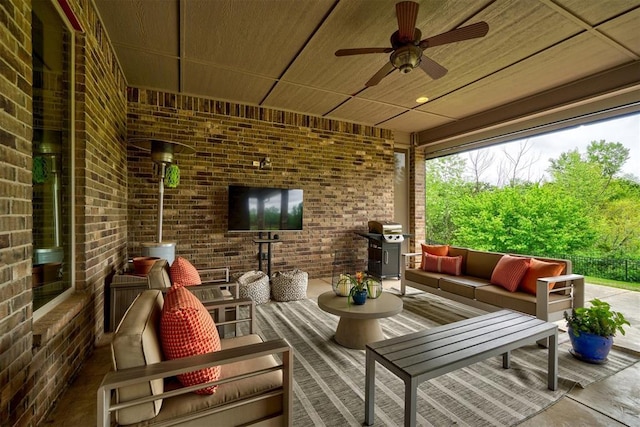 view of patio featuring an outdoor hangout area, a ceiling fan, and grilling area