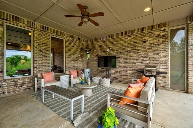 view of patio / terrace with an outdoor hangout area and ceiling fan