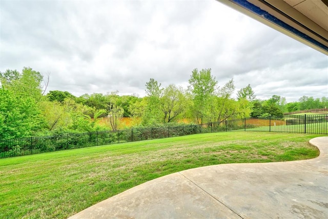 view of yard featuring a fenced backyard and a patio area