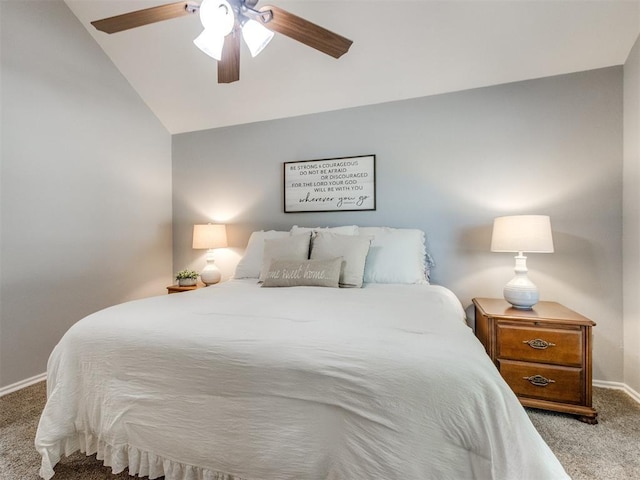 bedroom featuring vaulted ceiling, baseboards, ceiling fan, and carpet flooring
