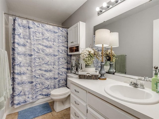 full bath with vanity, shower / tub combo, tile patterned flooring, and toilet