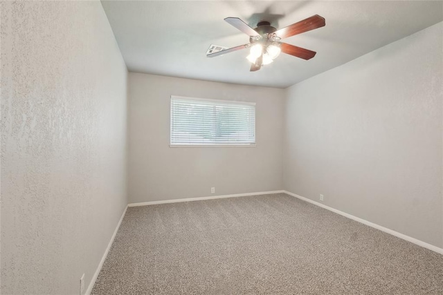 2417 NW 55th Ter, Oklahoma City, OK 73112 - unfurnished room featuring baseboards, carpet flooring, ceiling fan, and visible vents