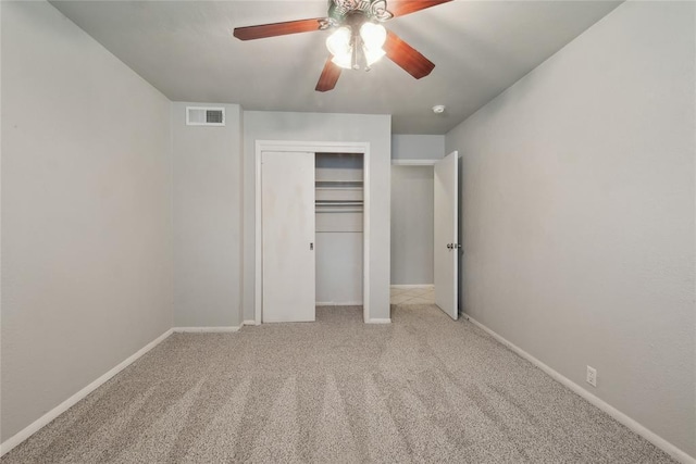 2417 NW 55th Ter, Oklahoma City, OK 73112 - unfurnished bedroom with carpet floors, ceiling fan, a closet, and visible vents