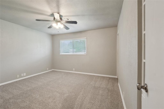 2417 NW 55th Ter, Oklahoma City, OK 73112 - carpeted spare room featuring a ceiling fan, a textured ceiling, visible vents, and baseboards