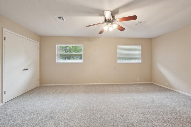 2417 NW 55th Ter, Oklahoma City, OK 73112 - unfurnished bedroom with carpet flooring and ceiling fan