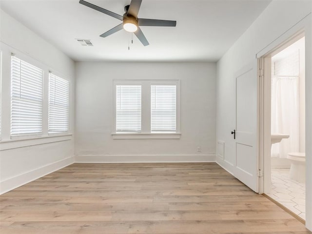 1132 NE 17th St, Oklahoma City, OK 73111 - unfurnished room featuring visible vents, a ceiling fan, baseboards, and light wood-type flooring