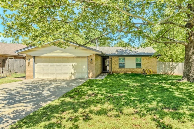 ranch-style house featuring a front yard, a garage, brick siding, fence, and concrete driveway
