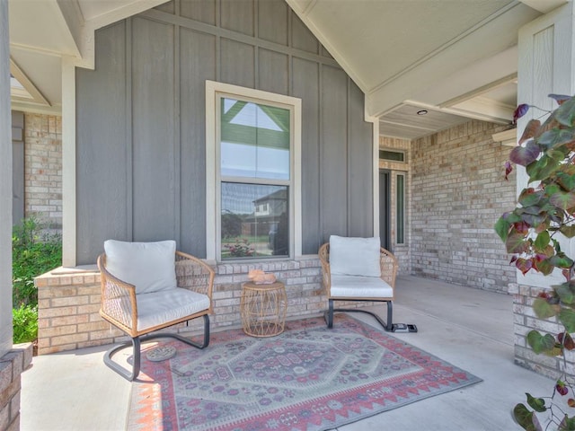 view of patio featuring a porch