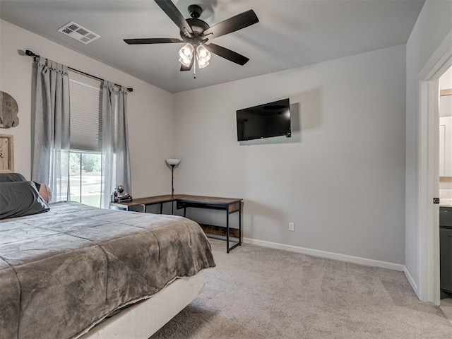 bedroom with visible vents, baseboards, ceiling fan, and light colored carpet