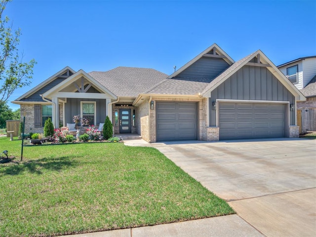 craftsman inspired home with an attached garage, a front lawn, board and batten siding, and concrete driveway