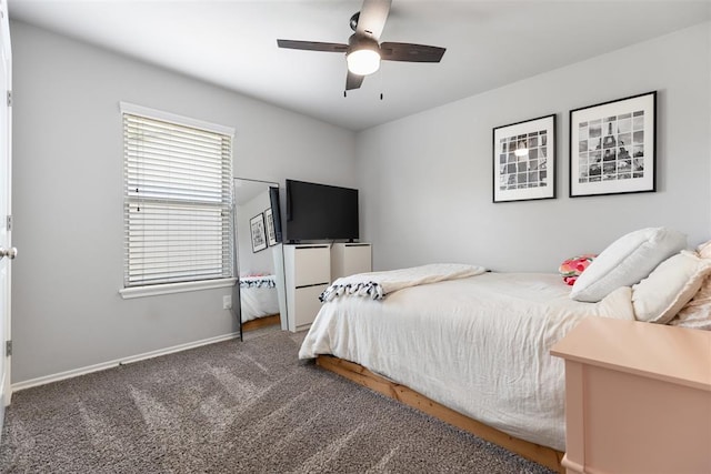 bedroom with baseboards, ceiling fan, and carpet