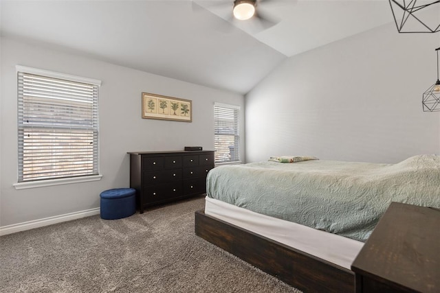 carpeted bedroom with baseboards, a ceiling fan, and lofted ceiling