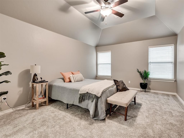 bedroom with baseboards, carpet flooring, a ceiling fan, and lofted ceiling
