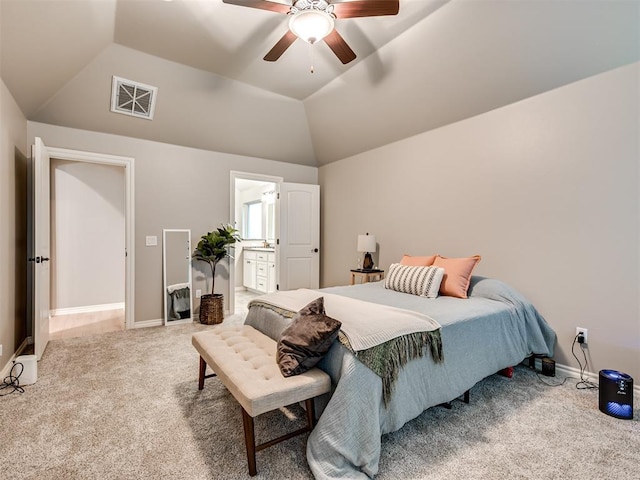 bedroom featuring carpet floors, lofted ceiling, and visible vents