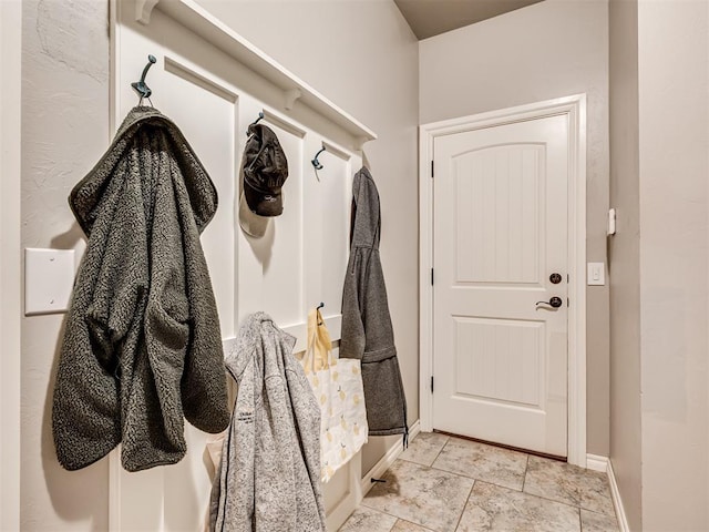 mudroom featuring baseboards