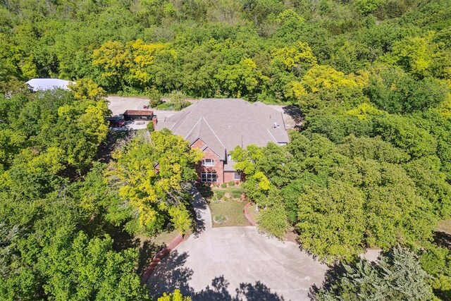 12700 Jabez Rd, Edmond, OK 73013 - aerial view of property and surrounding area featuring a heavily wooded area