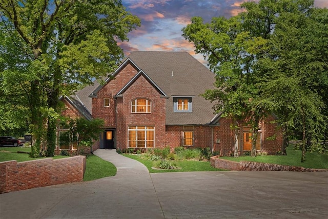 12700 Jabez Rd, Edmond, OK 73013 - traditional-style home with brick siding and a front yard
