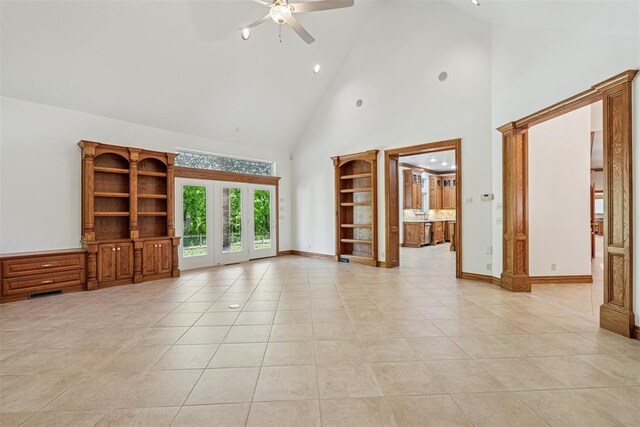 12700 Jabez Rd, Edmond, OK 73013 - unfurnished living room with ceiling fan, high vaulted ceiling, and light tile patterned floors
