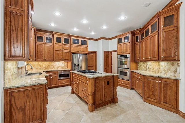 12700 Jabez Rd, Edmond, OK 73013 - kitchen with appliances with stainless steel finishes, brown cabinets, tasteful backsplash, and recessed lighting
