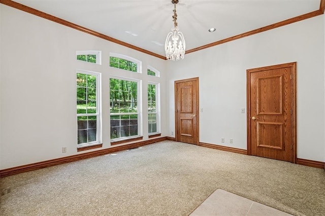 12700 Jabez Rd, Edmond, OK 73013 - carpeted spare room with a chandelier and crown molding