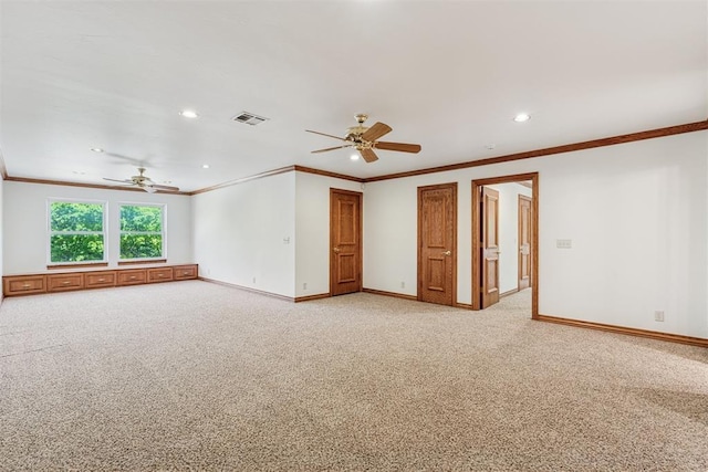 12700 Jabez Rd, Edmond, OK 73013 - empty room with ceiling fan, crown molding, light carpet, and recessed lighting