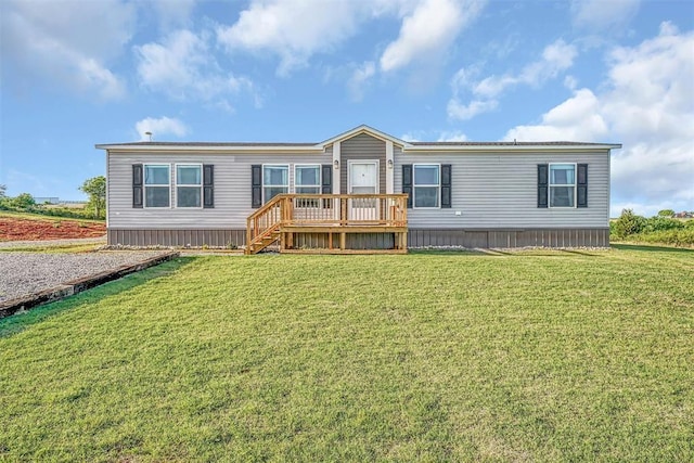 10284 N 2128, Foss, OK 73647 - view of front of house with a wooden deck and a front lawn