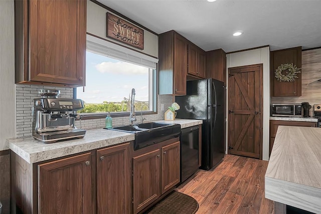 10284 N 2128, Foss, OK 73647 - kitchen with black appliances, a sink, light countertops, backsplash, and recessed lighting