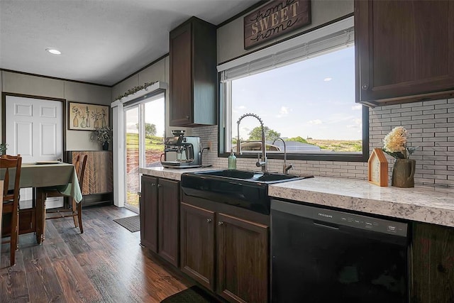 10284 N 2128, Foss, OK 73647 - kitchen featuring dishwasher, backsplash, light countertops, a sink, and recessed lighting