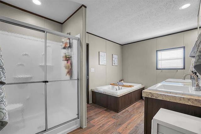 10284 N 2128, Foss, OK 73647 - full bath featuring wood finished floors, a stall shower, ornamental molding, vanity, and a textured ceiling