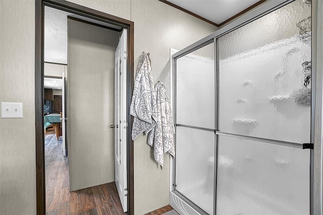 10284 N 2128, Foss, OK 73647 - full bath featuring wood finished floors, a shower stall, and crown molding