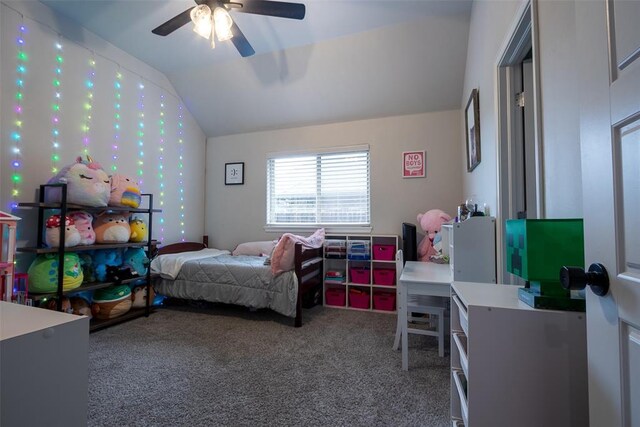 carpeted bedroom with lofted ceiling and a ceiling fan