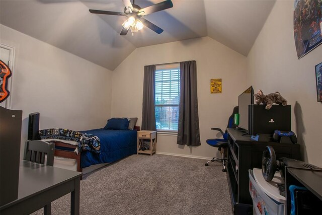 carpeted bedroom featuring lofted ceiling, ceiling fan, and baseboards