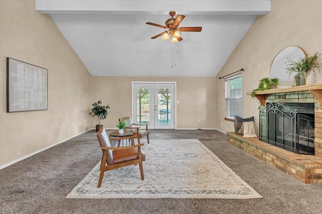 carpeted living area with beam ceiling, a brick fireplace, high vaulted ceiling, french doors, and a ceiling fan
