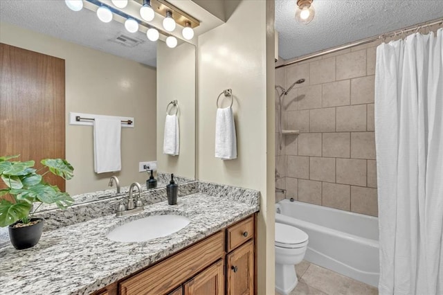 full bath featuring a textured ceiling, visible vents, tile patterned floors, toilet, and shower / tub combo with curtain