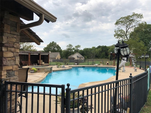 4495 SE 37th St, Norman, OK 73072 - view of swimming pool with a patio area, a pool with connected hot tub, and a water slide