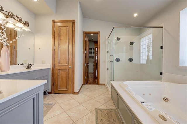 4495 SE 37th St, Norman, OK 73072 - bathroom featuring a stall shower, a jetted tub, vanity, lofted ceiling, and tile patterned flooring