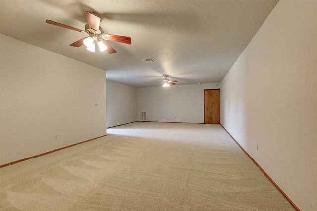 4495 SE 37th St, Norman, OK 73072 - unfurnished room with a ceiling fan and light colored carpet
