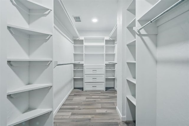 3408 Partridge Rd, Oklahoma City, OK 73120 - spacious closet with visible vents and wood finished floors