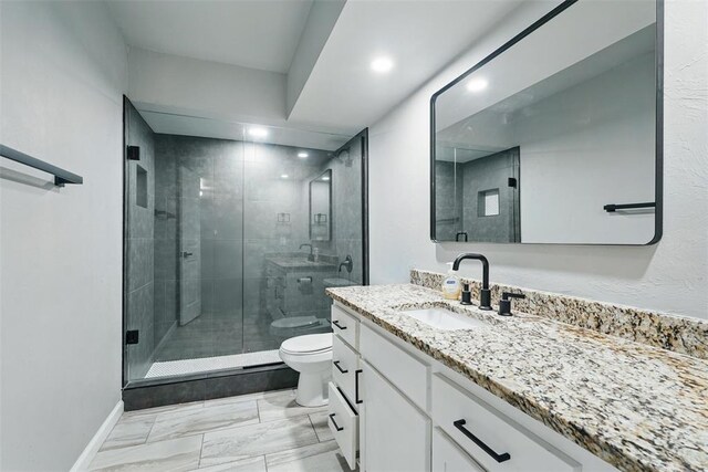 3408 Partridge Rd, Oklahoma City, OK 73120 - bathroom featuring vanity, marble finish floor, toilet, recessed lighting, and a stall shower