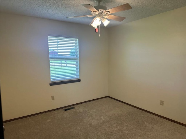 1721 E Ridgeview Ter, Mustang, OK 73064 - carpeted empty room featuring visible vents, a ceiling fan, and baseboards