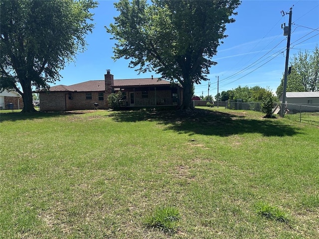 1721 E Ridgeview Ter, Mustang, OK 73064 - view of yard with fence