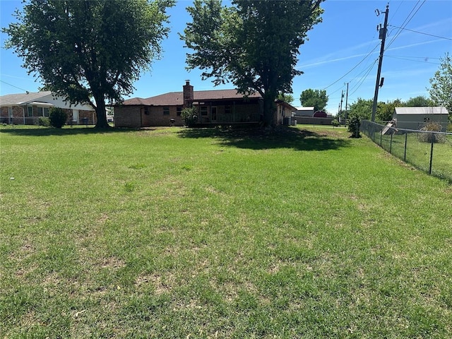 1721 E Ridgeview Ter, Mustang, OK 73064 - view of yard with fence
