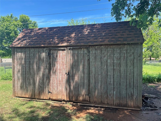 1721 E Ridgeview Ter, Mustang, OK 73064 - view of shed featuring fence