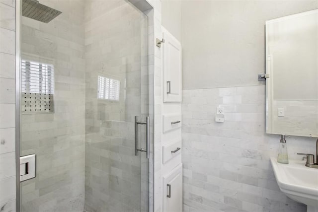 1912 NW 22nd St, Oklahoma City, OK 73106 - full bath featuring a stall shower, tile walls, and wainscoting