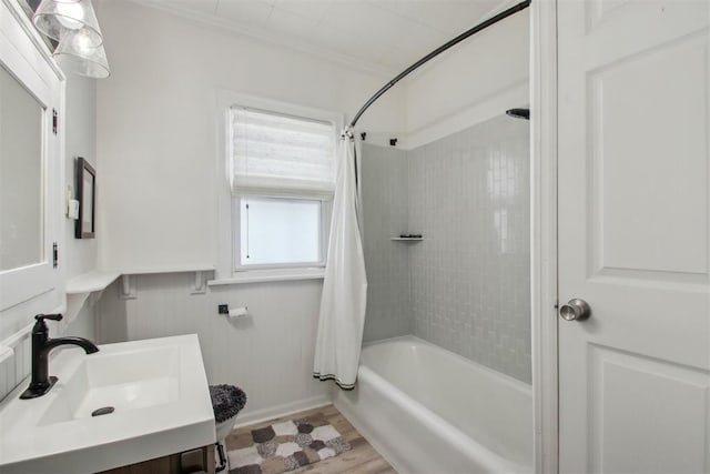 1912 NW 22nd St, Oklahoma City, OK 73106 - full bath with shower / tub combo, vanity, crown molding, and wood finished floors