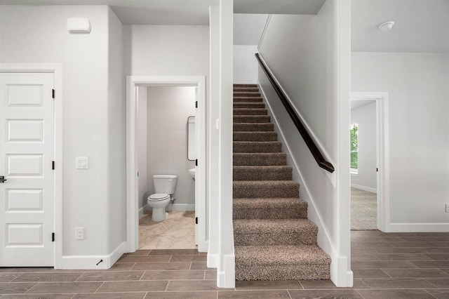 2375 Clubhouse Dr, Blanchard, OK 73010 - stairway featuring baseboards and wood finish floors